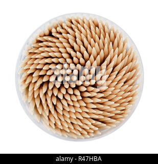 Wooden toothpicks in round plastic box isolated on white background. Stock Photo