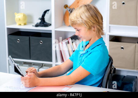 boy is using computer Stock Photo