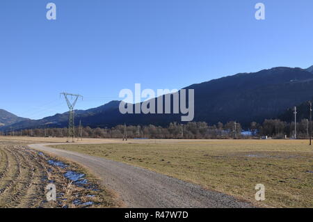 berg im drautal,carinthia,mountains,fields,winter,cold,meadow,trees Stock Photo