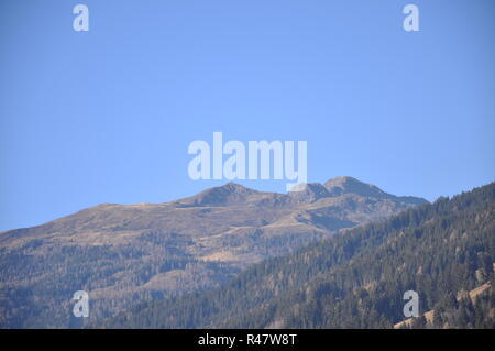 berg im drautal,carinthia,mountains,fields,winter,cold,meadow,trees Stock Photo