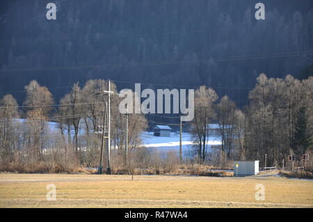 berg im drautal,carinthia,mountains,fields,winter,cold,meadow,trees Stock Photo