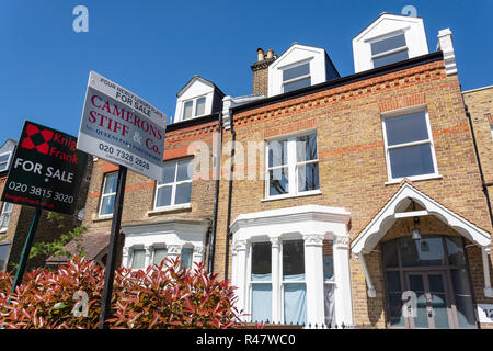 Flat for sale signs, Brondesbury Road, Queen's Park, Borough of Brent, Greater London, England, United Kingdom Stock Photo