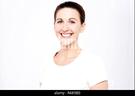 Middle aged woman posing casually Stock Photo