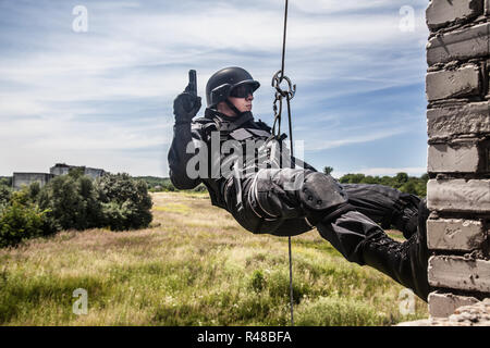 Police assault operation Stock Photo