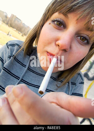 Teenage girl smoking,Teenage girl smoking,Teenage girl smoking,Teenage girl  smoking Stock Photo