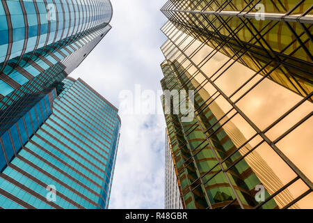 Looking up at the high rise buildings of the The Gateway Towers at Harbour City and the gold China Hong Kong City complex, Tsim Sha Tsui, Hong Kong Stock Photo