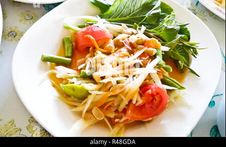 Thai papaya salad also known as Som Tum from Thailand. Stock Photo