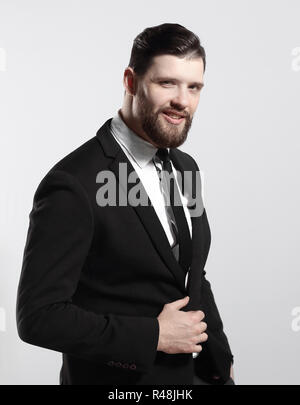 side view.portrait of a serious businessman.isolated on grey background Stock Photo