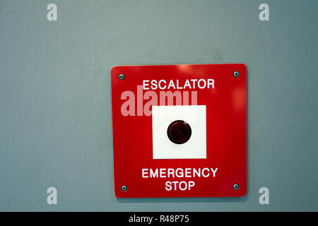 Red Emergency Stop Button on London Underground Tube wall Stock Photo