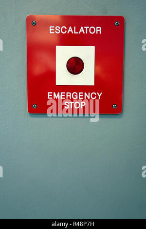 Red Emergency Stop Button on London Underground Tube wall Stock Photo