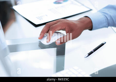 closeup.businessman using a computer mouse .photo with copy space Stock Photo