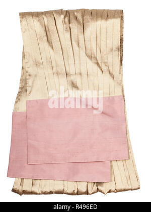 sewing gold and pink silk scarf isolated on white