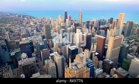 Aerial view of downtown Chicago city skyline and Lake Michigan from above in Chicago, Illinois (logos blurred for commercial use) Stock Photo