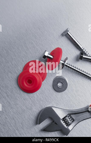 Spanner tool and screws Stock Photo