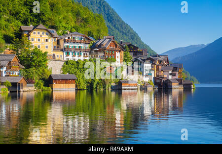 Traditional old wooden houses in famous Hallstatt mountain village at Hallstattersee lake in the Austrian Alps in summer, region of Salzkammergut, Aus Stock Photo