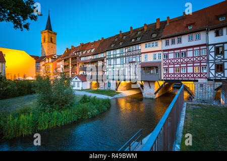 Historic city center of Erfurt with famous Krämerbrücke bridge illuminated at beautiful twilight during blue hour, Erfurt, Thüringen, Germany Stock Photo