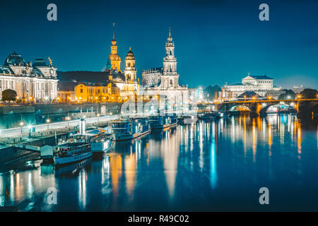 Classic twilight view of the historic city of Dresden reflecting in beautiful Elbe river during blue hour at dusk, Saxony, Germany Stock Photo