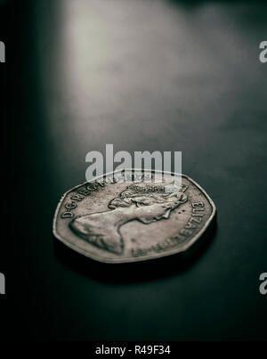 British coin fifty pence 1979, circular pattern of crowns, Queen Elizabeth II young head right. Fifty pence. Stock Photo