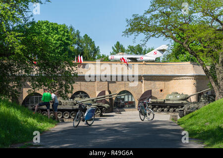 Poland Museum, exterior view of cold war era tanks and aircraft on display outside the Army Museum in Citadel Park in the city of Poznan, Poland. Stock Photo