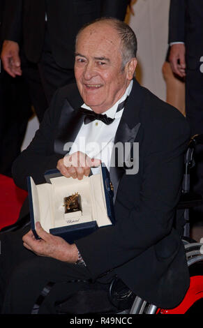 Cannes, France. 11th May, 2011. Director Bernardo Bertolucci arrive showing his honorary Golden Palme during the 64th International Film Festival at Agora in Cannes, France, on 11 May 2011. Credit: Hubert Boesl | usage worldwide/dpa/Alamy Live News Stock Photo