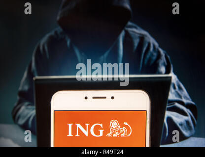 Hong Kong. 23rd Nov, 2018. Dutch multinational banking and financial services company ING Group logo is seen on an Android mobile device with a figure of hacker on the background. Credit: Miguel Candela/SOPA Images/ZUMA Wire/Alamy Live News Stock Photo