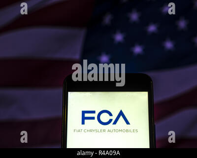 Kiev, Ukraine. 26th Nov, 2018. Fiat Chrysler Automobiles, Automobile company logo seen displayed on smart phone. Credit: Igor Golovniov/SOPA Images/ZUMA Wire/Alamy Live News Stock Photo