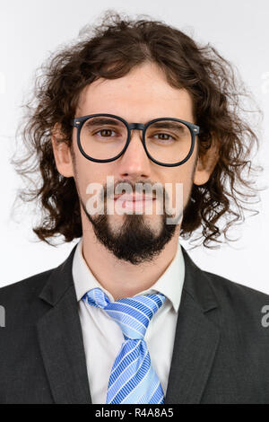 Face of young handsome Caucasian businessman wearing eyeglasses Stock Photo