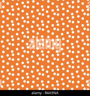 Orange background scattered dots polka seamless pattern . Vector illustration. Stock Vector