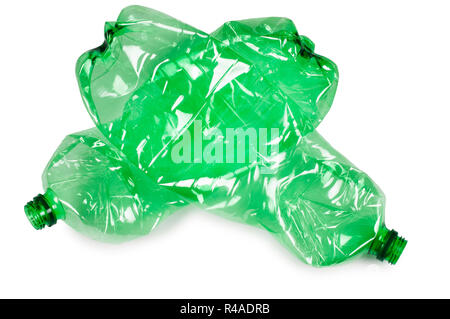 Studio shot of a pair of crushed water bottles isolated on white - John Gollop Stock Photo