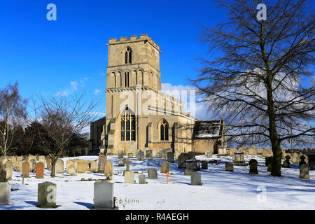 Winter snow, St Peters church, Maxey village, Cambridgeshire England UK Stock Photo