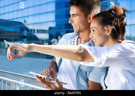 young couple using a digital tablet Stock Photo