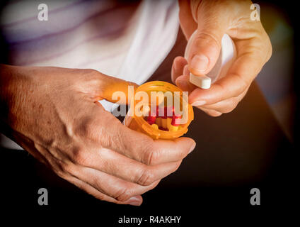 Middle-aged woman takes medication daily, image conceptual Stock Photo