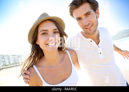 Couple having fun at the beach Stock Photo