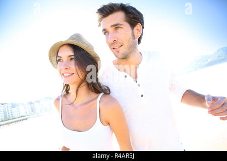 Couple having fun at the beach Stock Photo