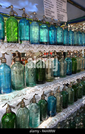 Old siphon bottles for soda, flea market of Buenos Aires Stock Photo