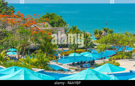 Biajo Beach, Panama, Central America - May 28th, 2017: Despite a slowing economy, people enjoy vacationing at a turquoise colored Biaja, Panama resort. Stock Photo