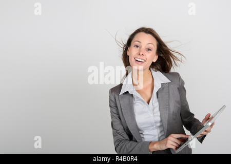 Smiling businesswoman using digital tablet Stock Photo