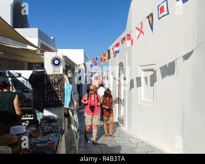 Tourist visiting the hawker street on Satorini, Greece Stock Photo
