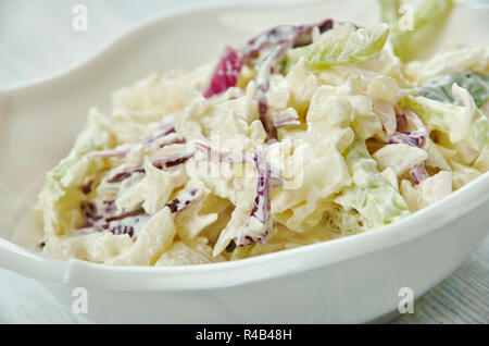 Classic Memphis-Style Coleslaw, from the vinegar and a sprinkling of sweetness from the sugar. Stock Photo