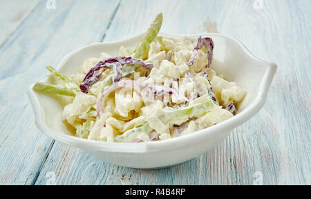 Classic Memphis-Style Coleslaw, from the vinegar and a sprinkling of sweetness from the sugar. Stock Photo