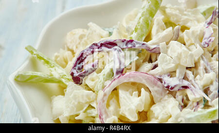 Classic Memphis-Style Coleslaw, from the vinegar and a sprinkling of sweetness from the sugar. Stock Photo