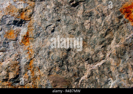 Grey stone surface with rusty marks Stock Photo