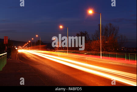 Traffic in  o raod at night with light Stock Photo