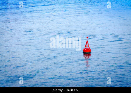 Marine buoy in the sea to warn the ships Stock Photo