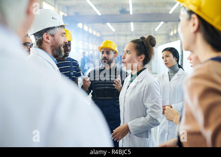 Angry Woman Shouting at Managers Stock Photo