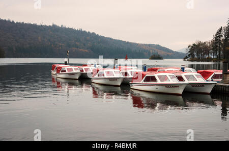 Sailing boats on a calm Windermere lake at Bowness on Windermere Cumbria. England UK Stock Photo