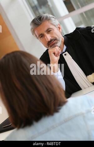 Lawyer meeting client in courthouse office Stock Photo