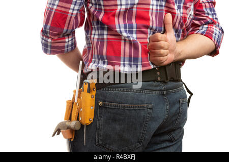 Close-up of constructor male showing thumb up behind back isolated on white background Stock Photo