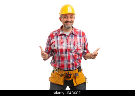Smiling man constructor holding fingers at both hands as guns in playful concept isolated on white background Stock Photo