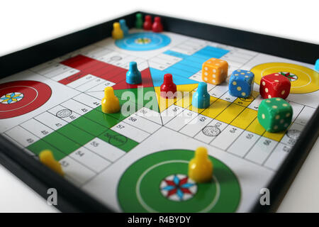 Plastic ludo board game isolated on a white background, close upstrategic Stock Photo